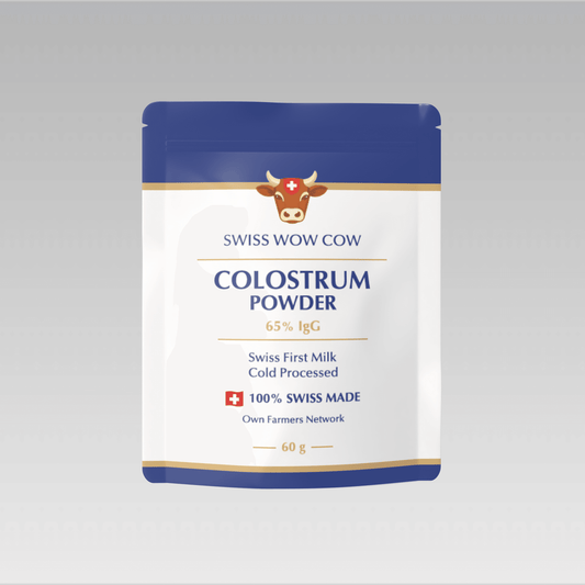 Swiss Wow Cow Colostrum Powder, 60g pack, cold-processed, 65% IgG, featuring blue and white packaging with a cow graphic.