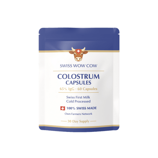 Swiss Wow Cow Colostrum Capsules, 65% IgG, 60 capsules, blue and white packaging, 100% Swiss made, 30-day supply.