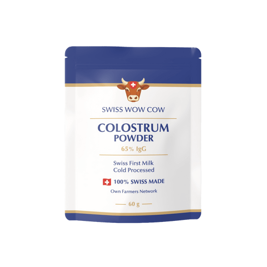 Swiss Wow Cow Colostrum Powder, 60g, cold-processed, 65% IgG, blue and white packaging, 100% Swiss made.